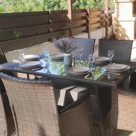 Beach And Pool With Deck, Outdoor Furniture And Stone Bbq